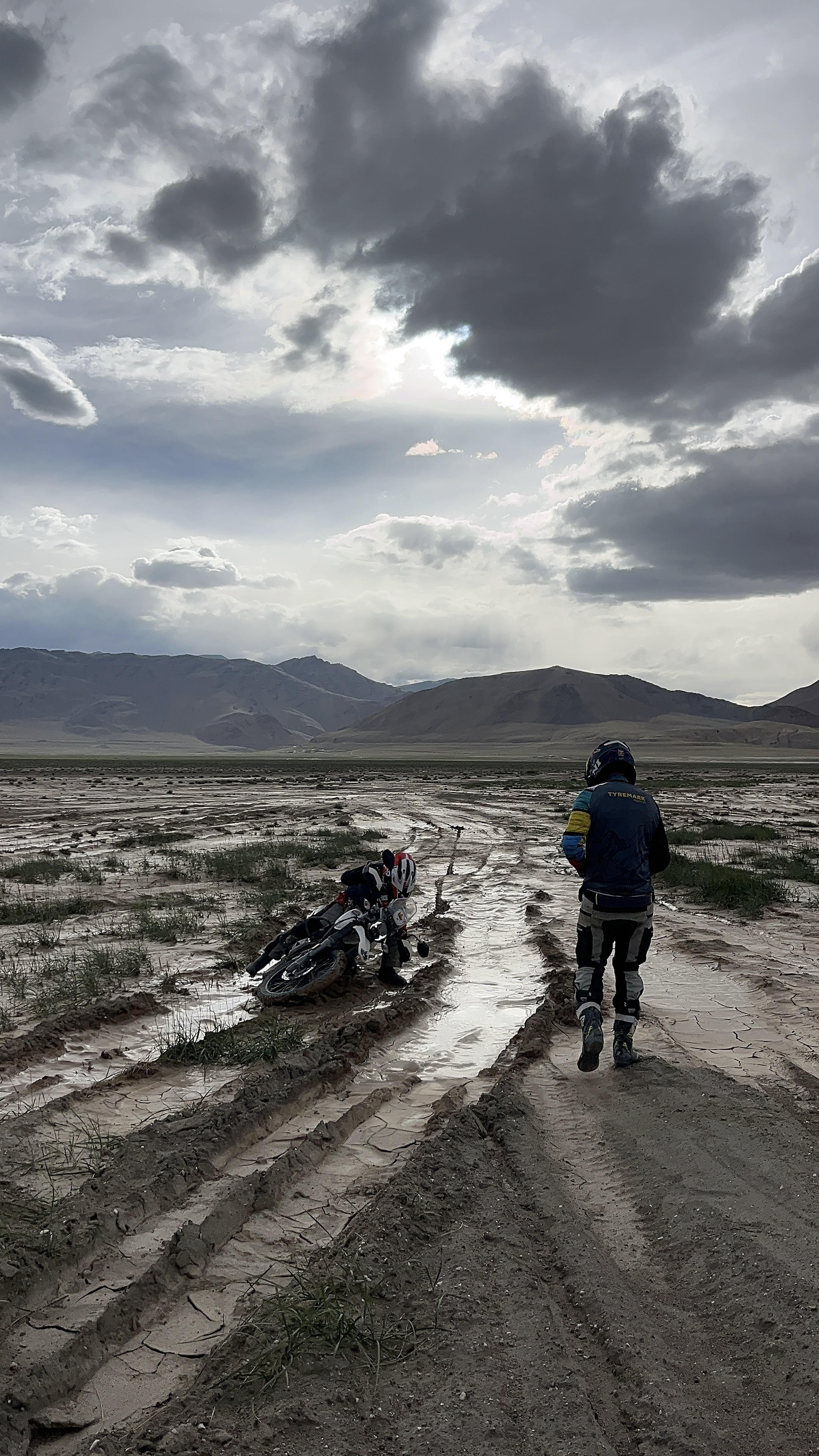 Rider on high altitude mountain pass in Ladakh India