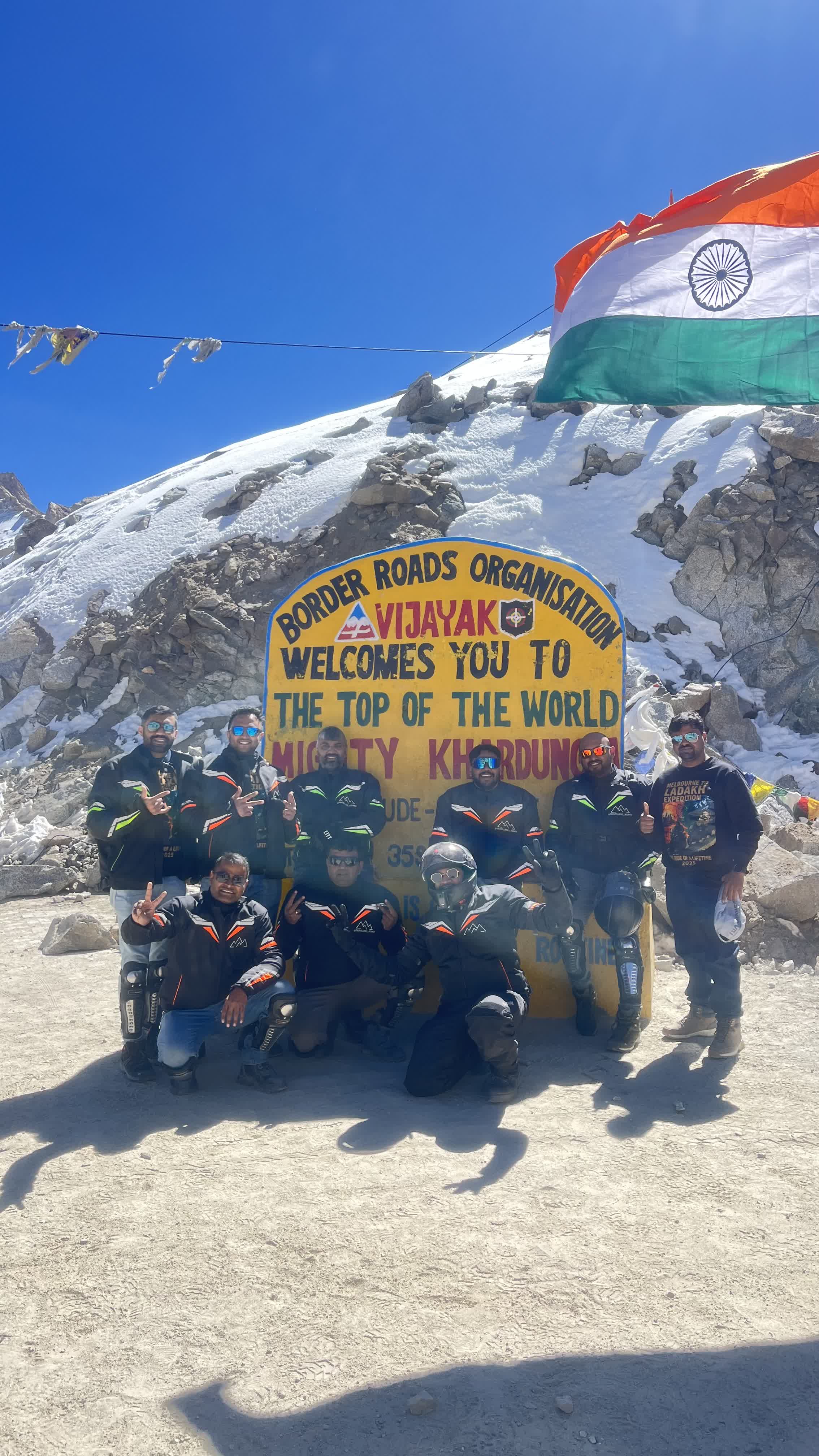 Motorcycle riding switchback roads on Himalayan mountain pass Ladakh