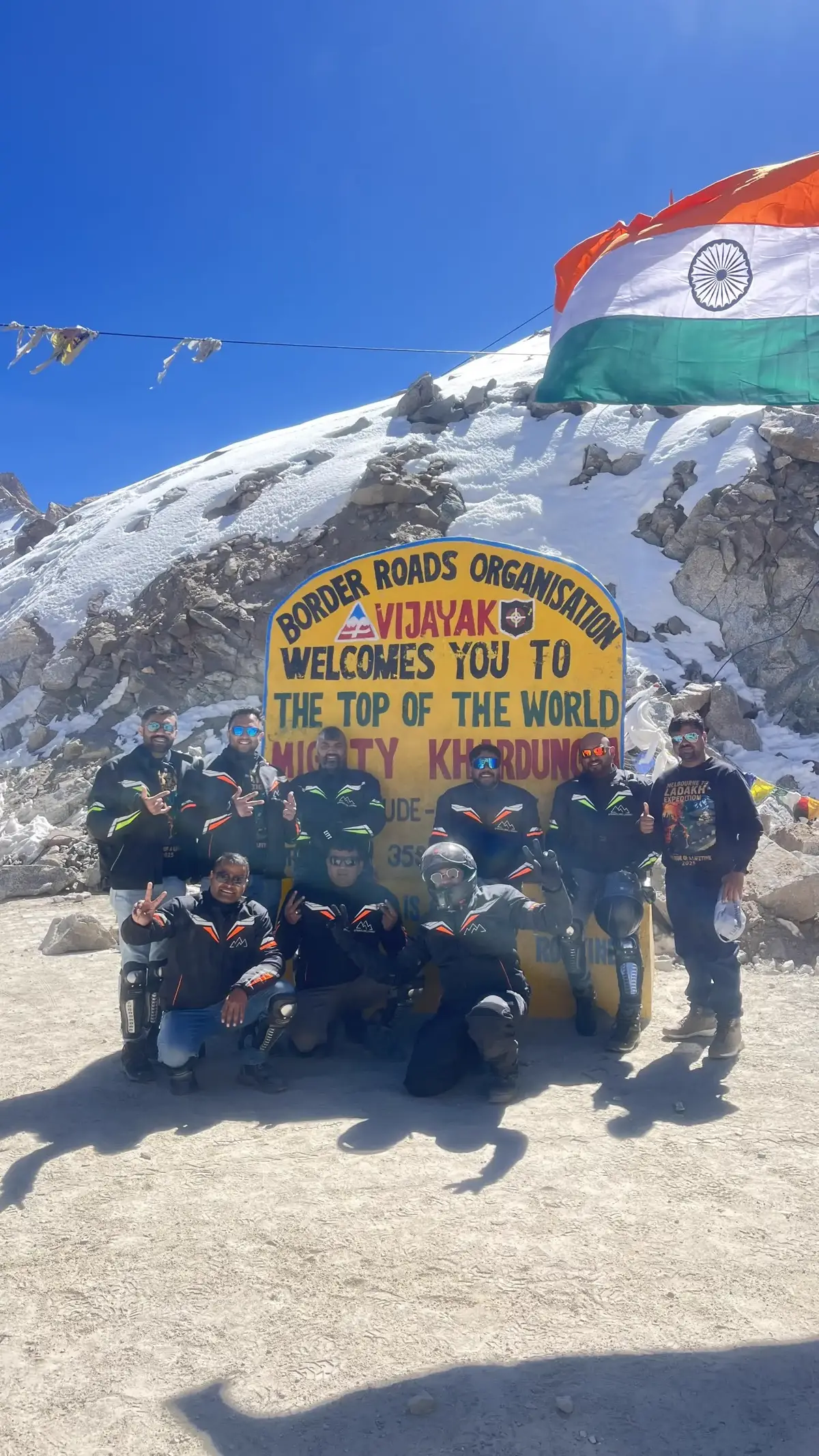 Motorcycle riding switchback roads on Himalayan mountain pass Ladakh