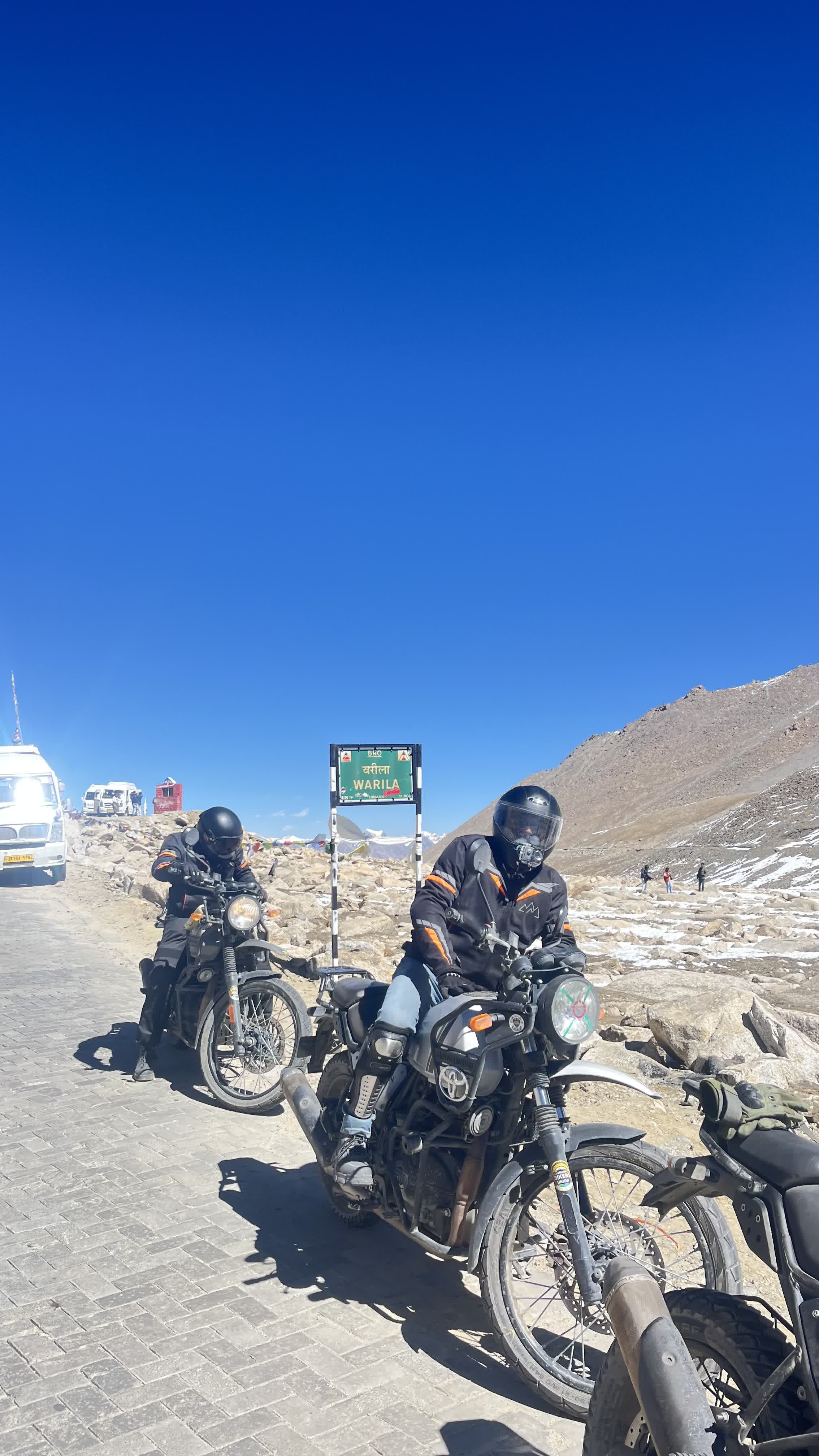 Rider on motorcycle in Nubra Valley cold desert Ladakh Himalaya